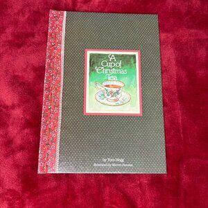 Like new, "A cup of Christmas Tea" book by Tom Hegg, vintage 1982